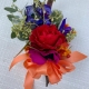 corsage with peach ribbon
