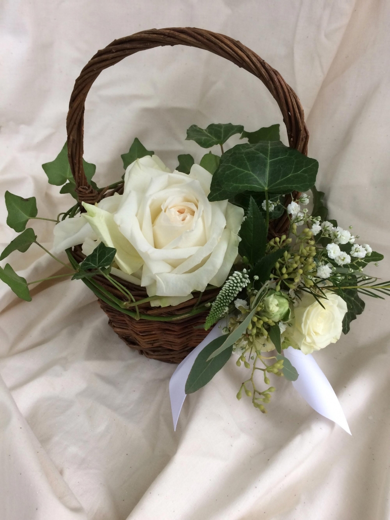 basket with flowers and ivy