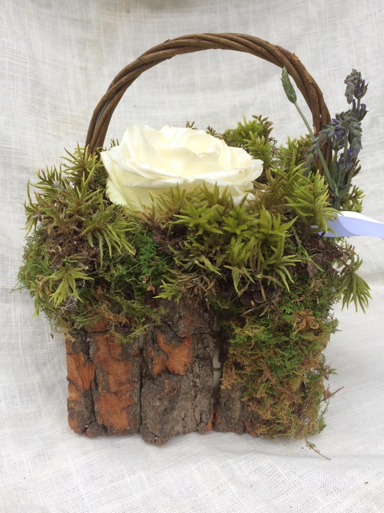 bark basket with flowers and moss